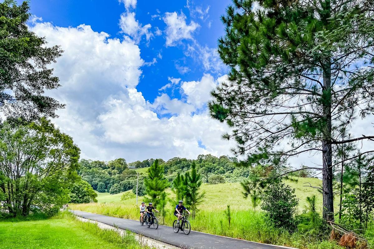 Group of riders on E Bikes at Stokers Siding on the Northern Rivers Rail Trail.
