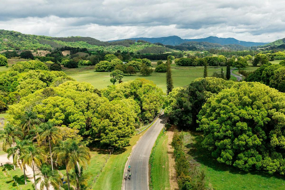 Drone shot of E bike riders in The Pocket with Mount Jerusalem National Park in abckground