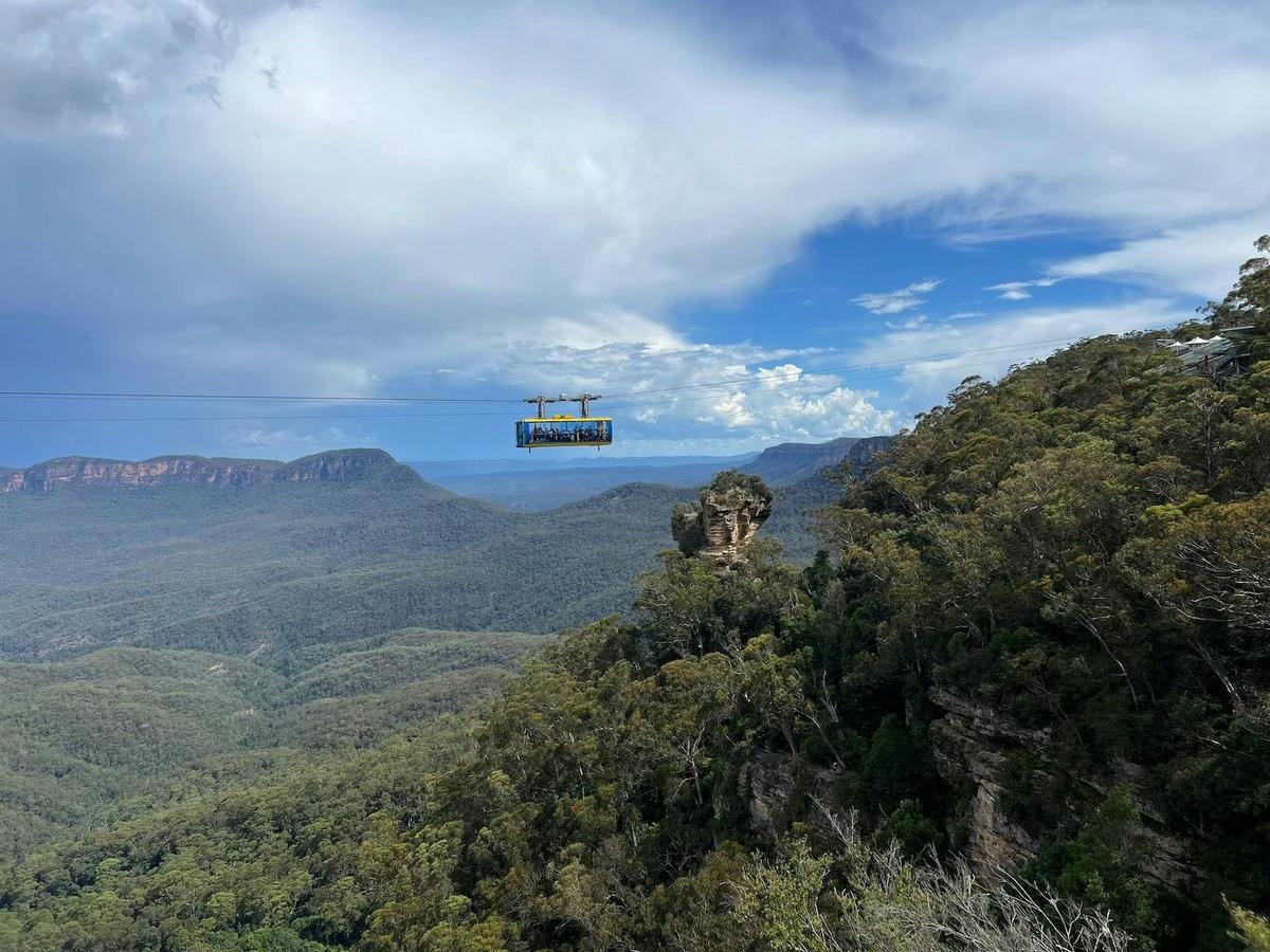 Orphan Rock with a cable car nearby, offering stunning views of the Blue Mountains.