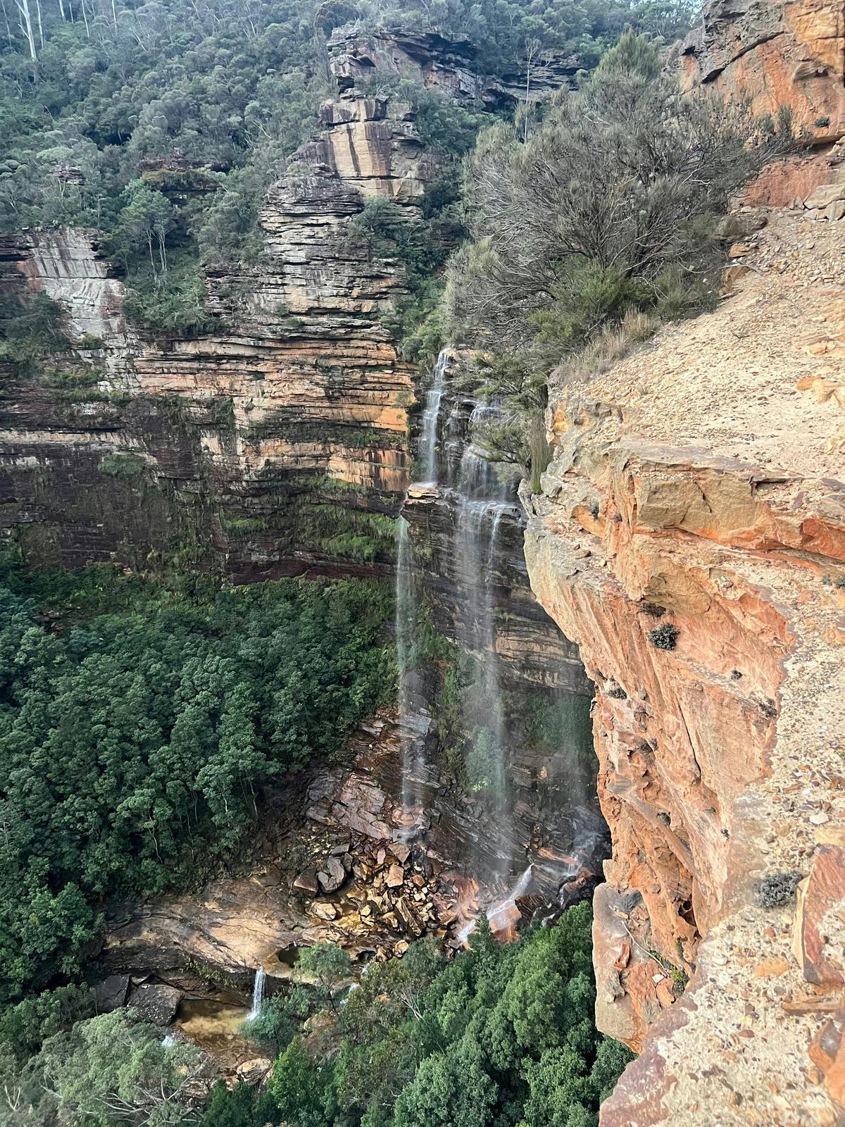 Marvel at the cascading beauty of Wentworth Falls, where water plunges over sandstone cliffs in the