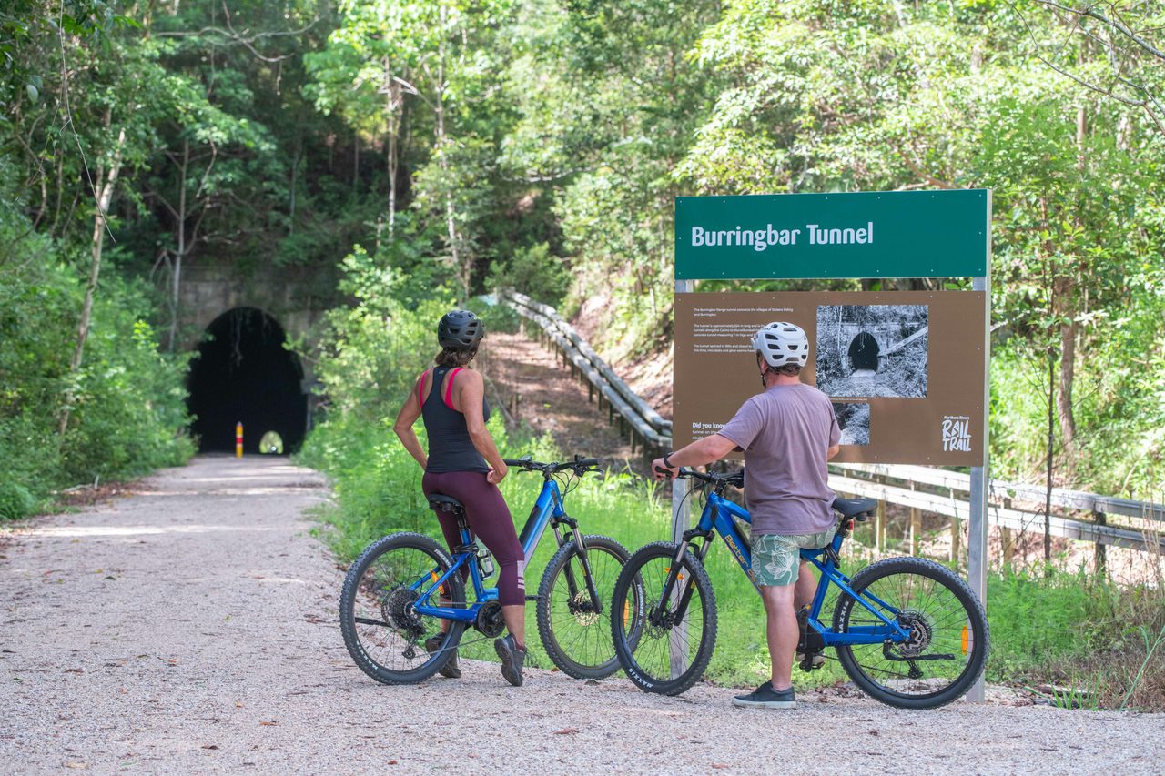 Reading the history about the Northern Rivers Rail Trail as you ride along with Better By Bike