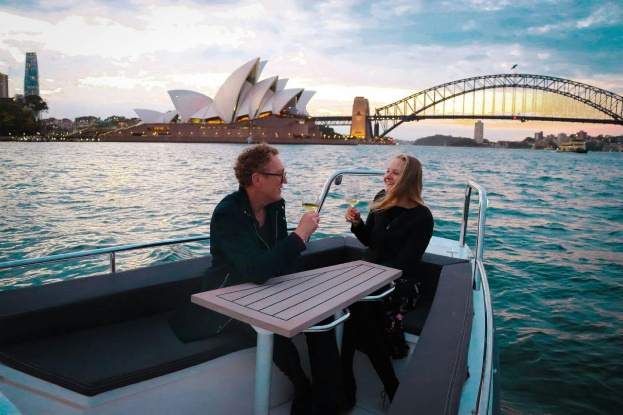 Axopar with view of opera house and harbour bridge