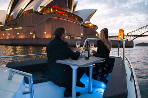 Champagne cruise past the opera house