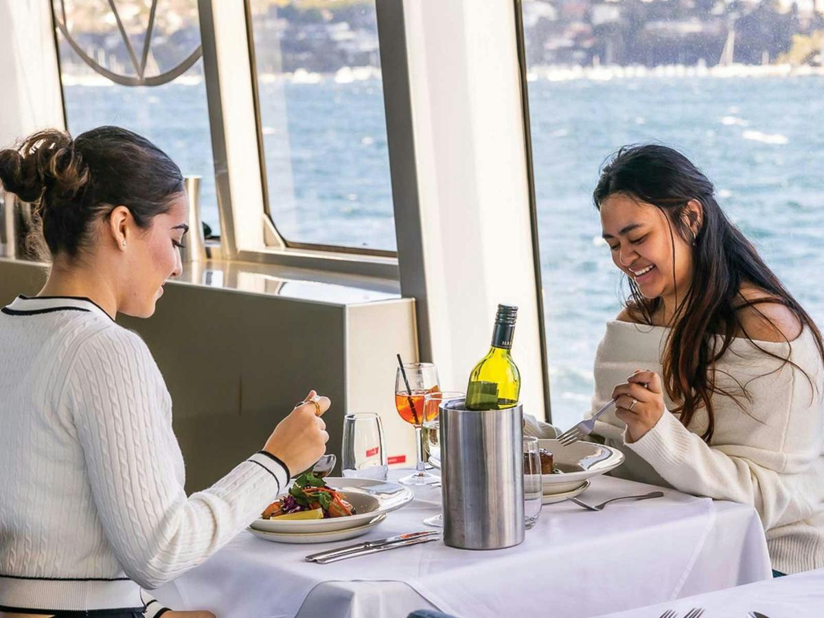 Guests enjoying lunch on Clearview Glass Boat