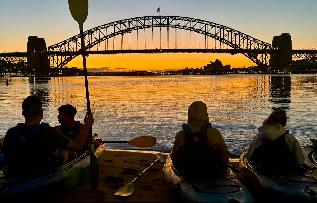 Sunrise starts differently on Sydney Harbour.