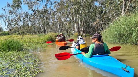 A family on a Waterbirds & Wetlands Tour