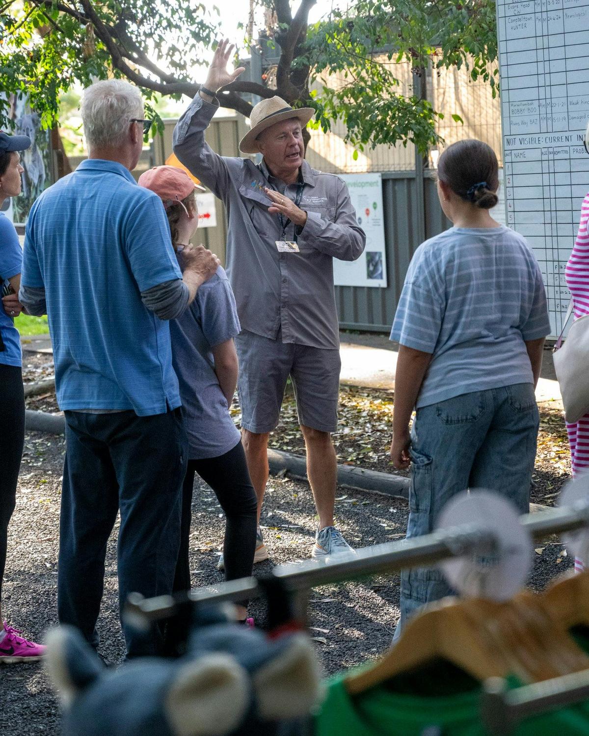 KCA guide with visitors