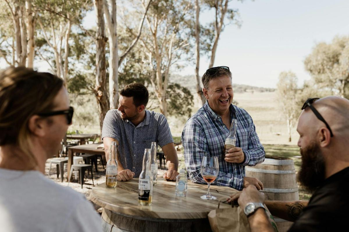 Mudgee Ale Trail Clients enjoying a winery setting outdoors