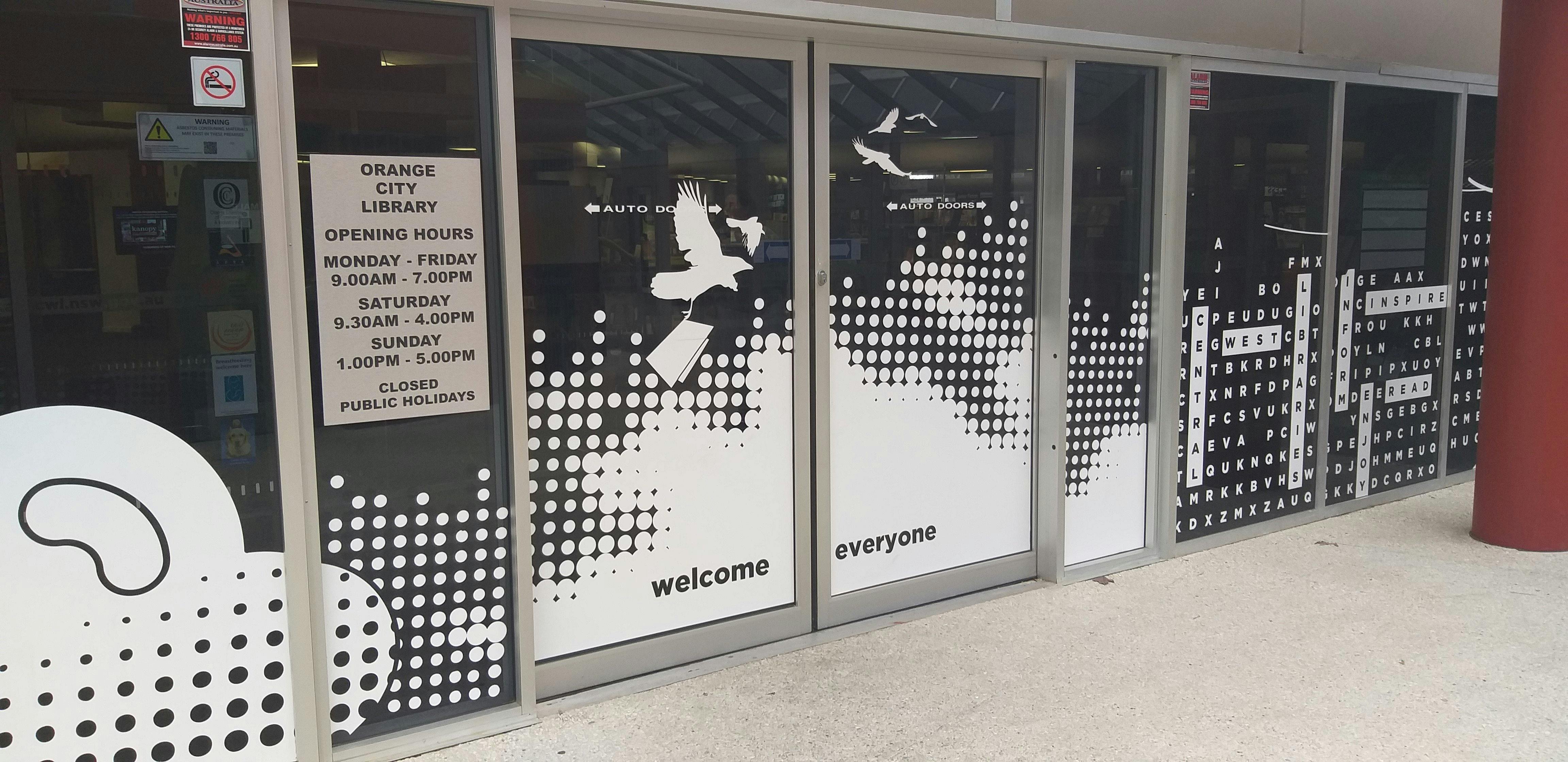 Welcome Everyone Library Doors