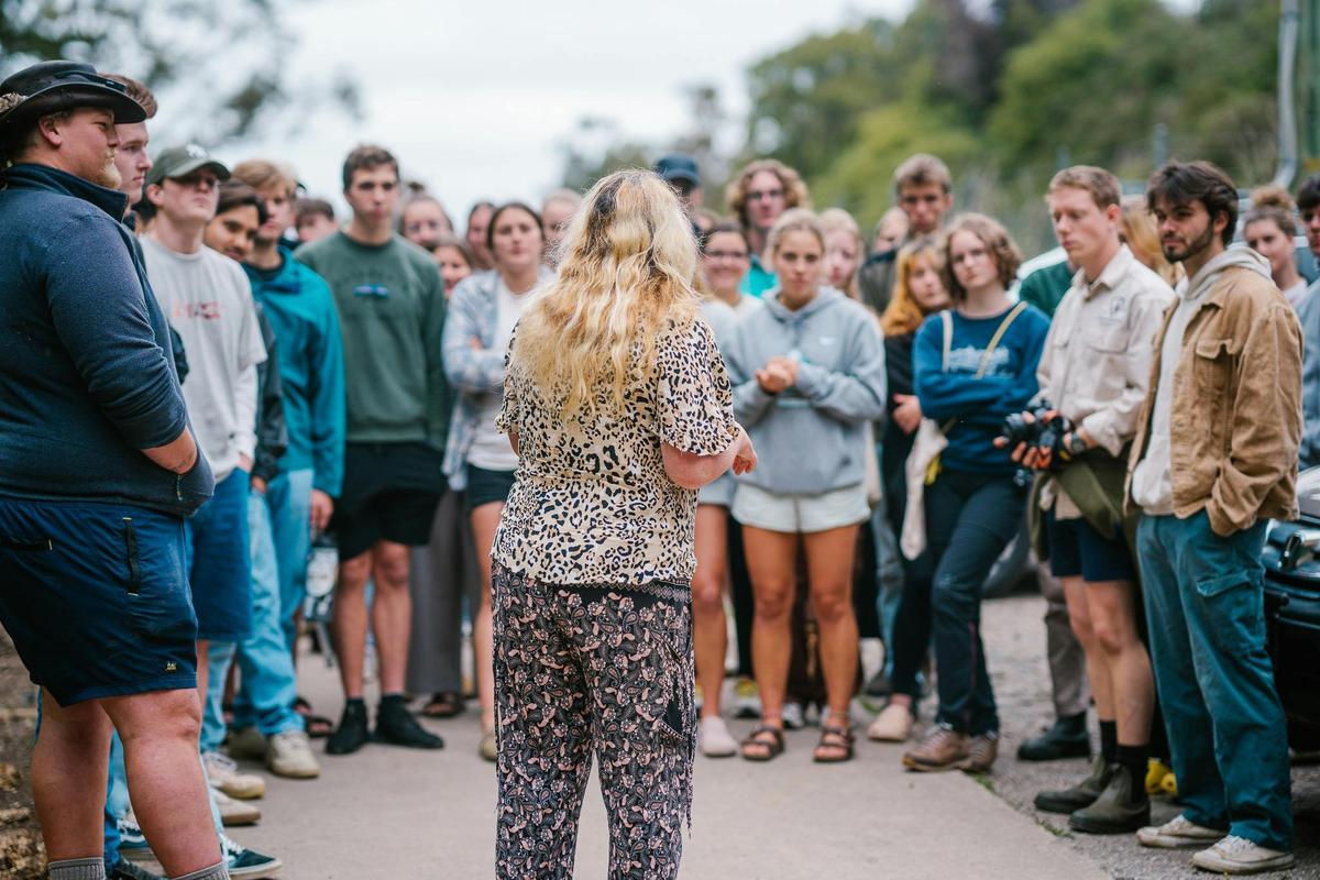 Tour guide talking to group