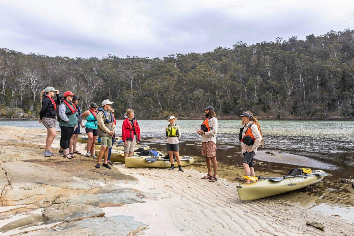 Guests listening to Aboriginal cultural stories