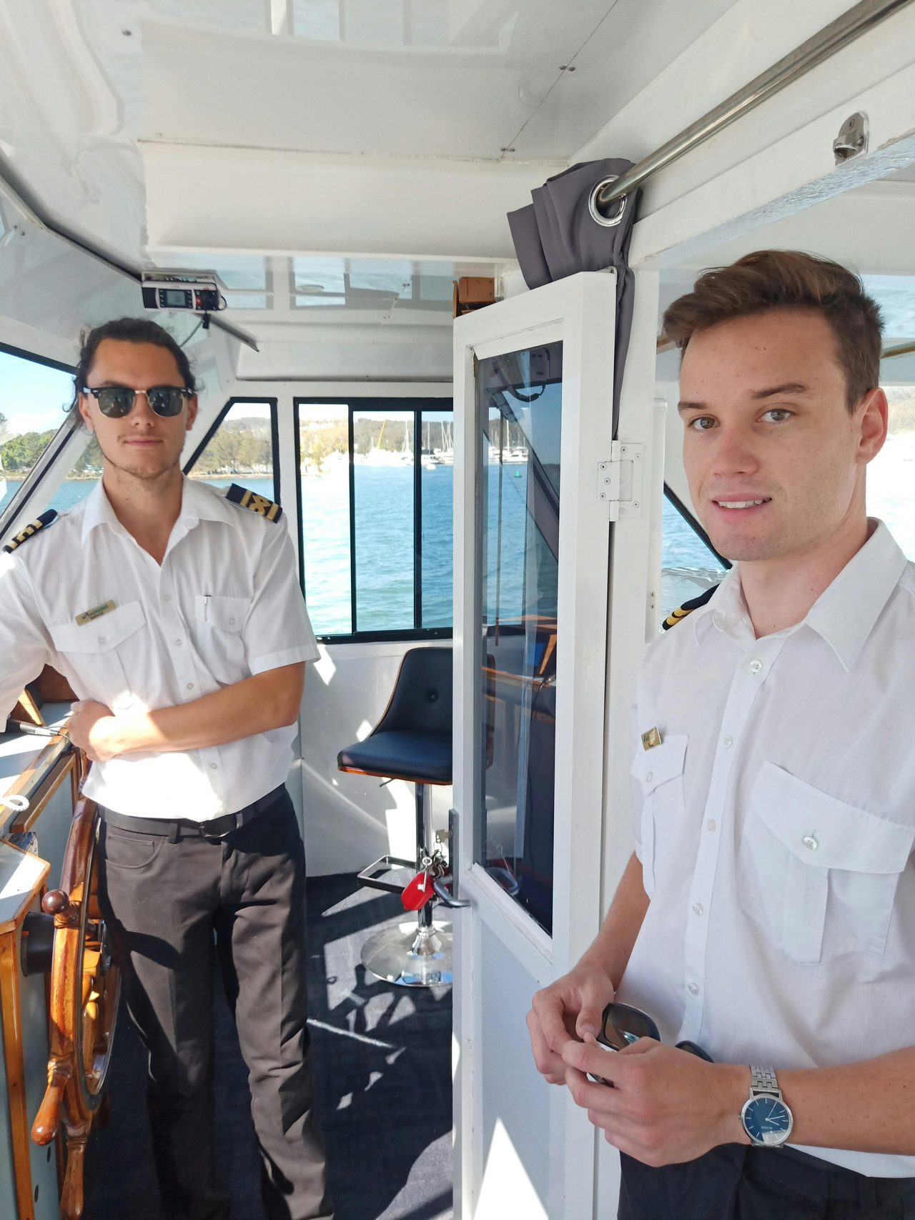 Skipper Bryce and Deckhand Will on the bridge of Lady Mac