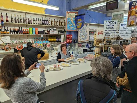 Visit an authentic Italian deli and sample cheeses and cured meats