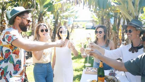 Localing guests enjoying drinks in a banana farm.