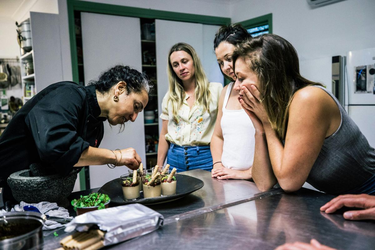 Localing guests see how a local delicacy is made.