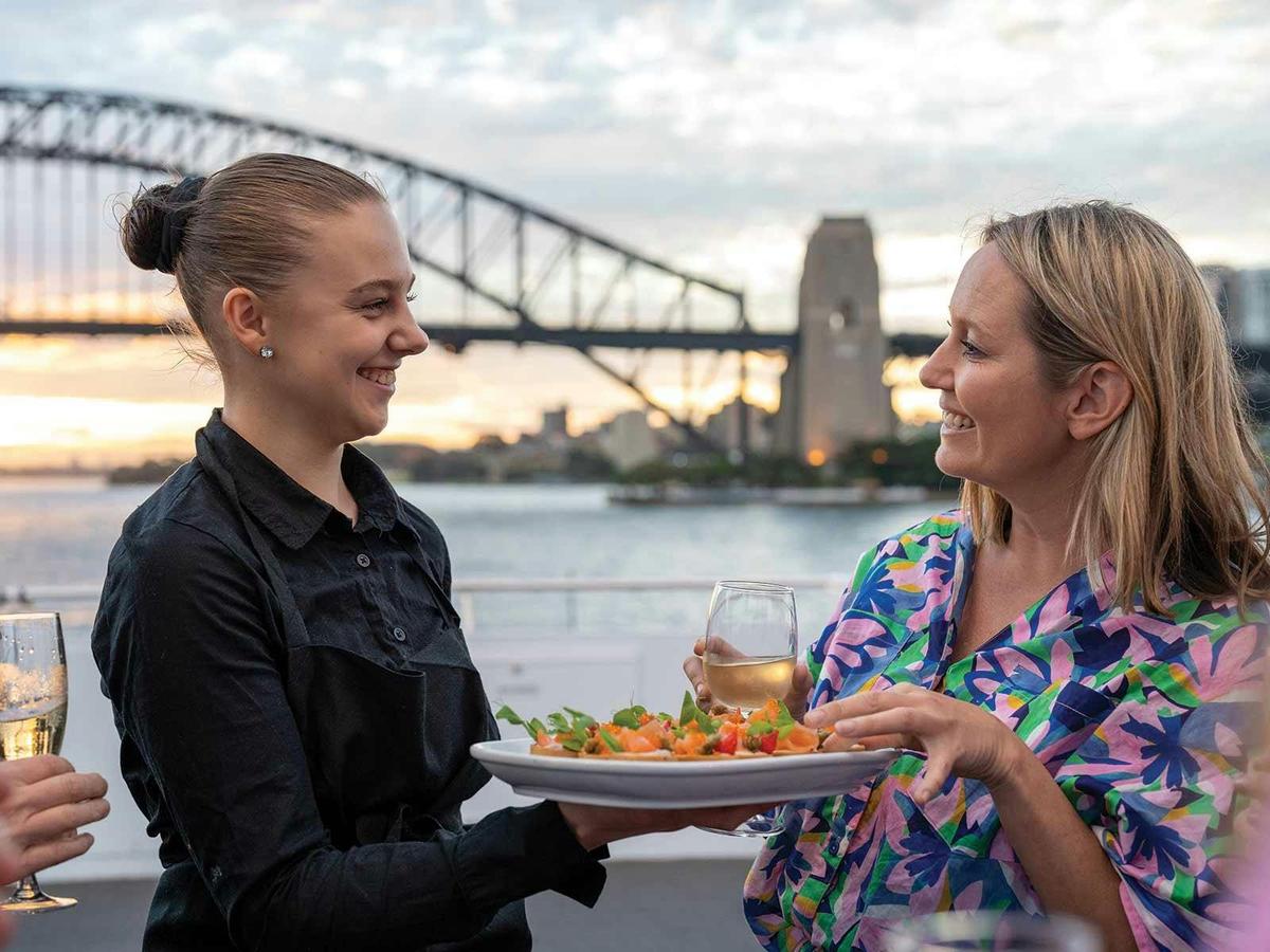Guests enjoying a drink on the deck