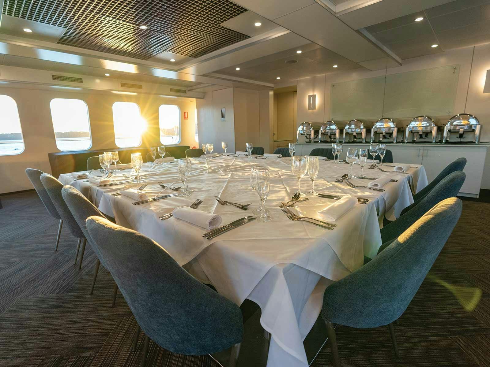 The elegant dining setup aboard the 'Magistic Two'