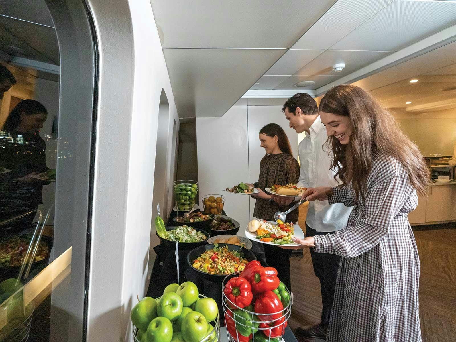Guests serving themselves the multi-cuisine buffet