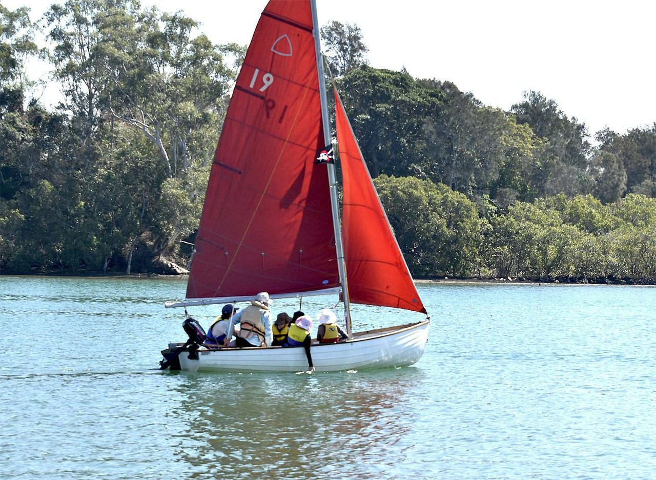 School children having fun on the Kalang River, Urunga