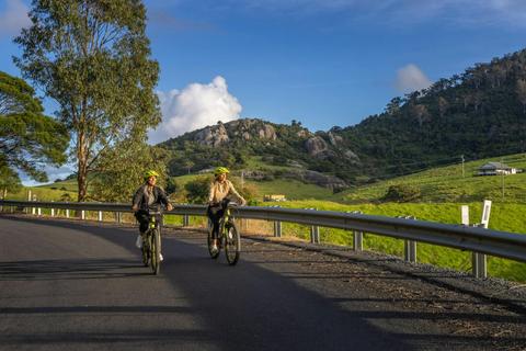 Riding into Central Tilba through dairy country