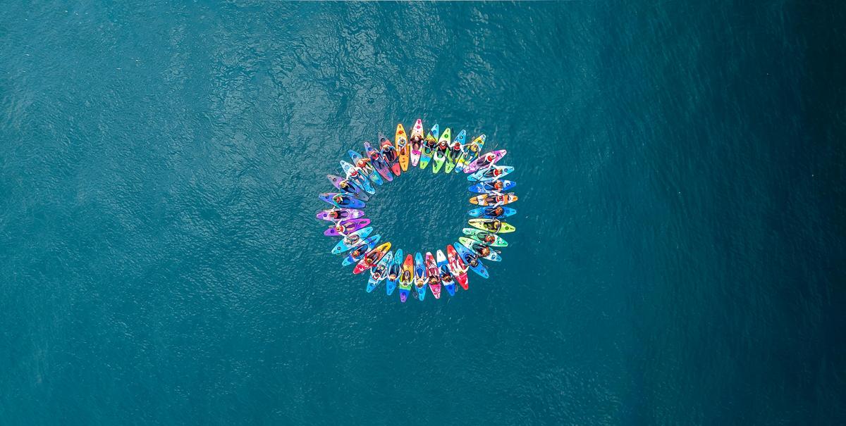Colourful Kayaks on Sydney Harbour like a rainbow!