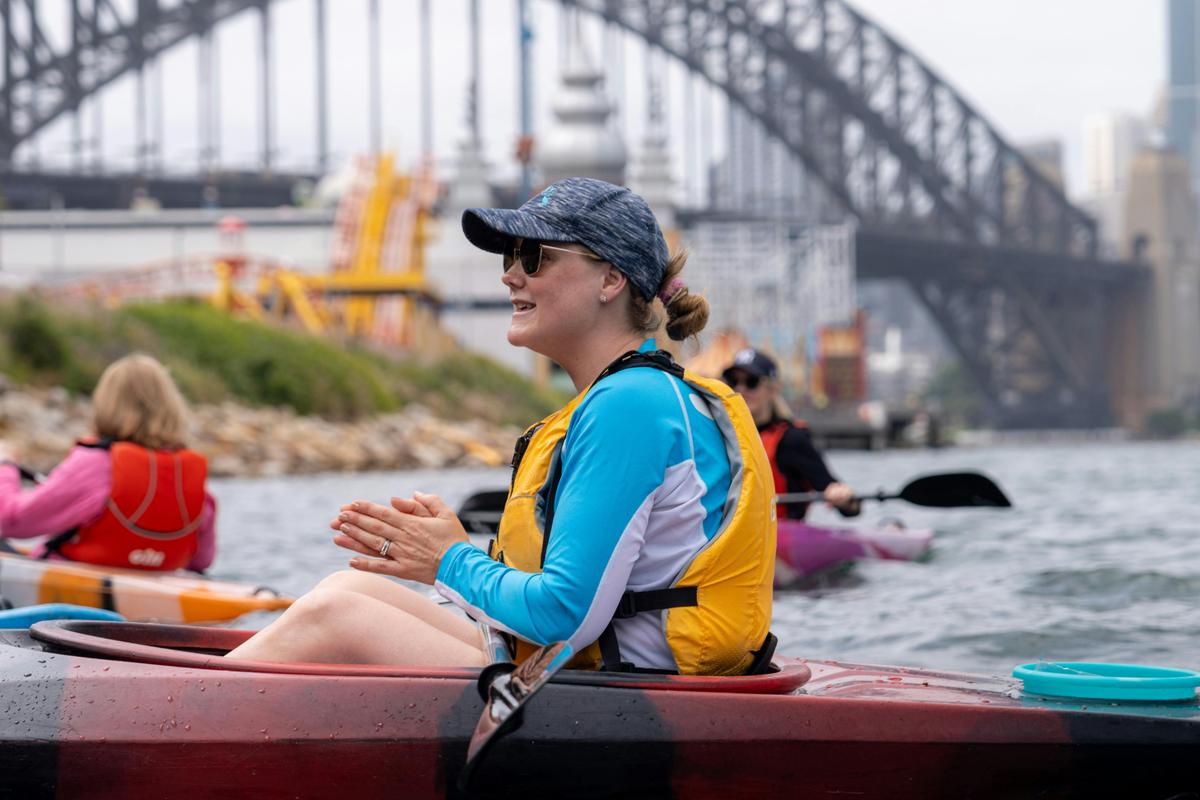 Laura Stone leads Corporate Clean-up Paddle on Sydney Harbour while Sydney businesses give back.