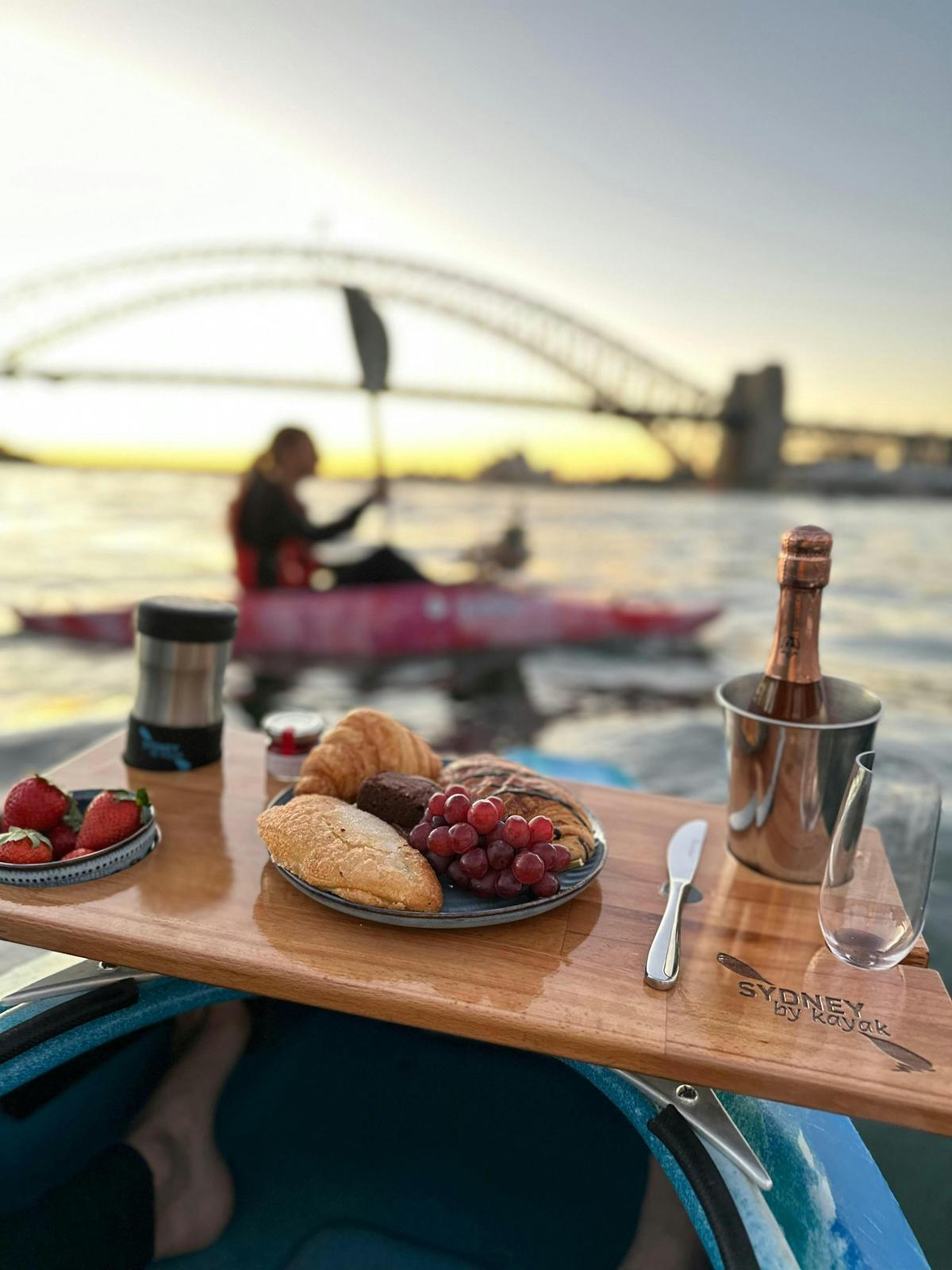 Kayak with a floating Champagne Breakfast from kayaks at sunrise on Sydney Harbour.