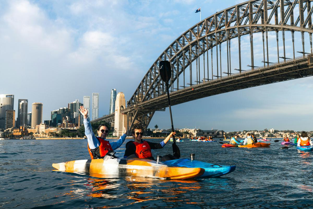 Kayakers get their high res photos after paddling below the Sydney Harbour Bridge!