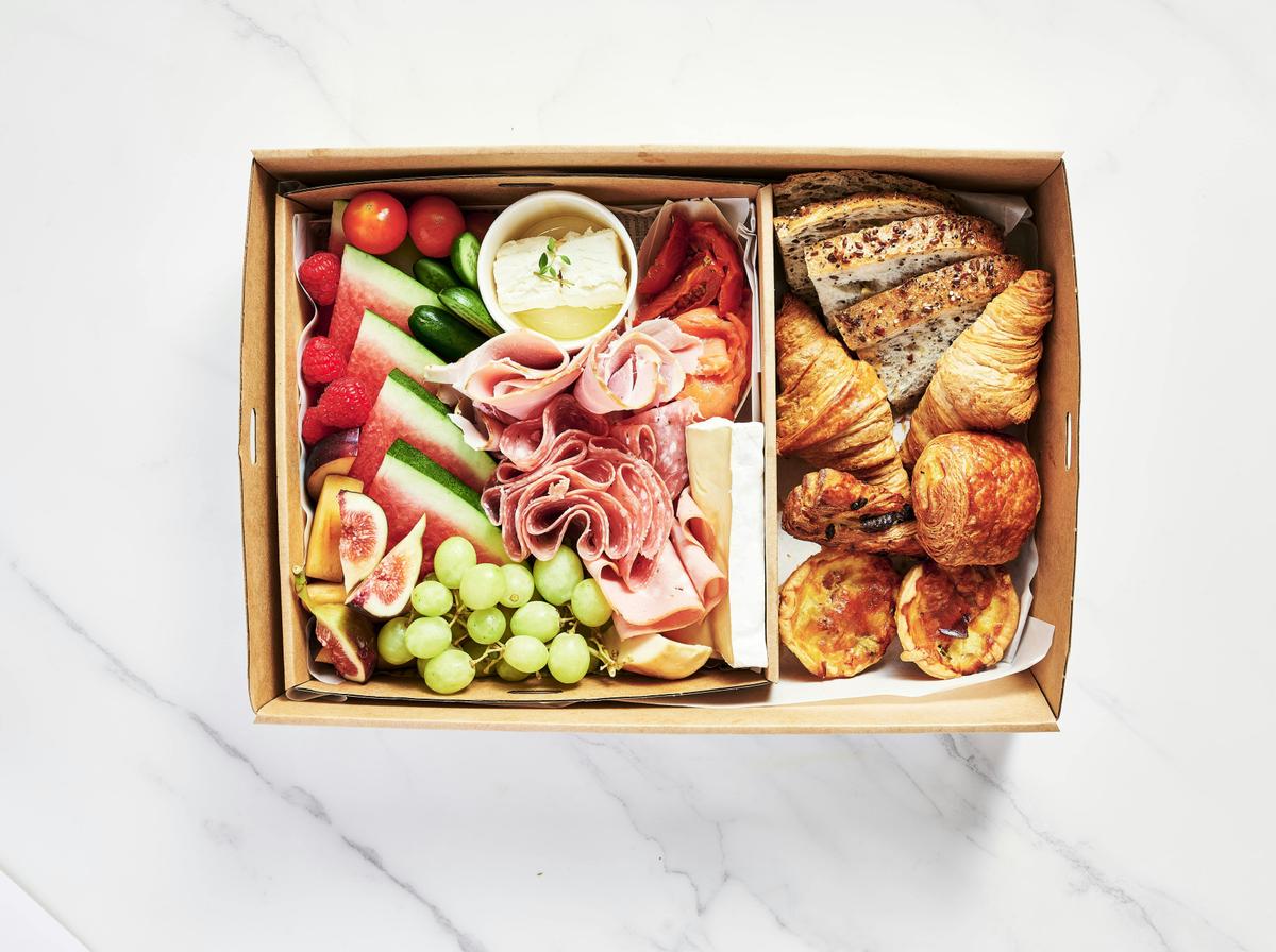 MV Explorer luxury cruise boat on Sydney Harbour with Harbour Bridge in the background.