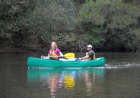 Two paddlers gliding along the pristine waterways of the Kangaroo RIver