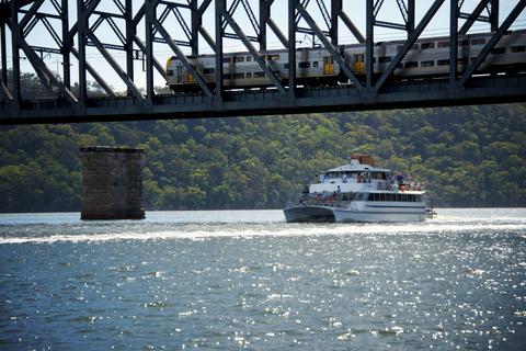 The mail boat under the Hawkesbury River train bridge