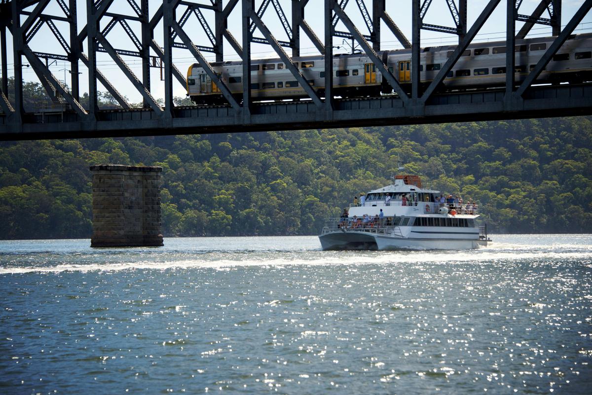 The mail boat under the Hawkesbury River train bridge