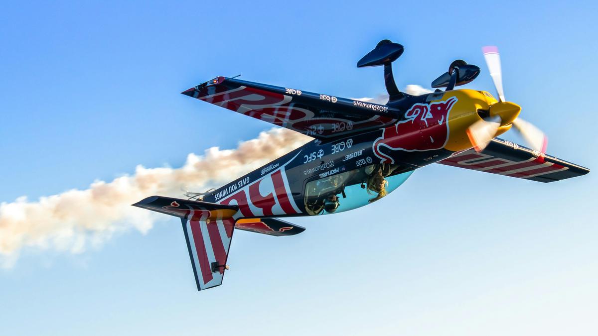 Matt Hall Racing Red Bull plane inverted over Lake Macquarie, NSW