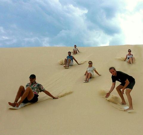 Sandboarding. Sit down or stand up with us!