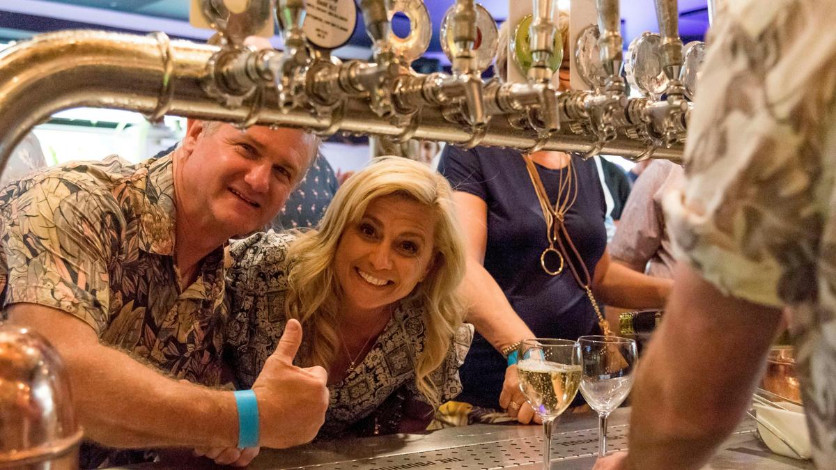 Smiling Guests at Bar