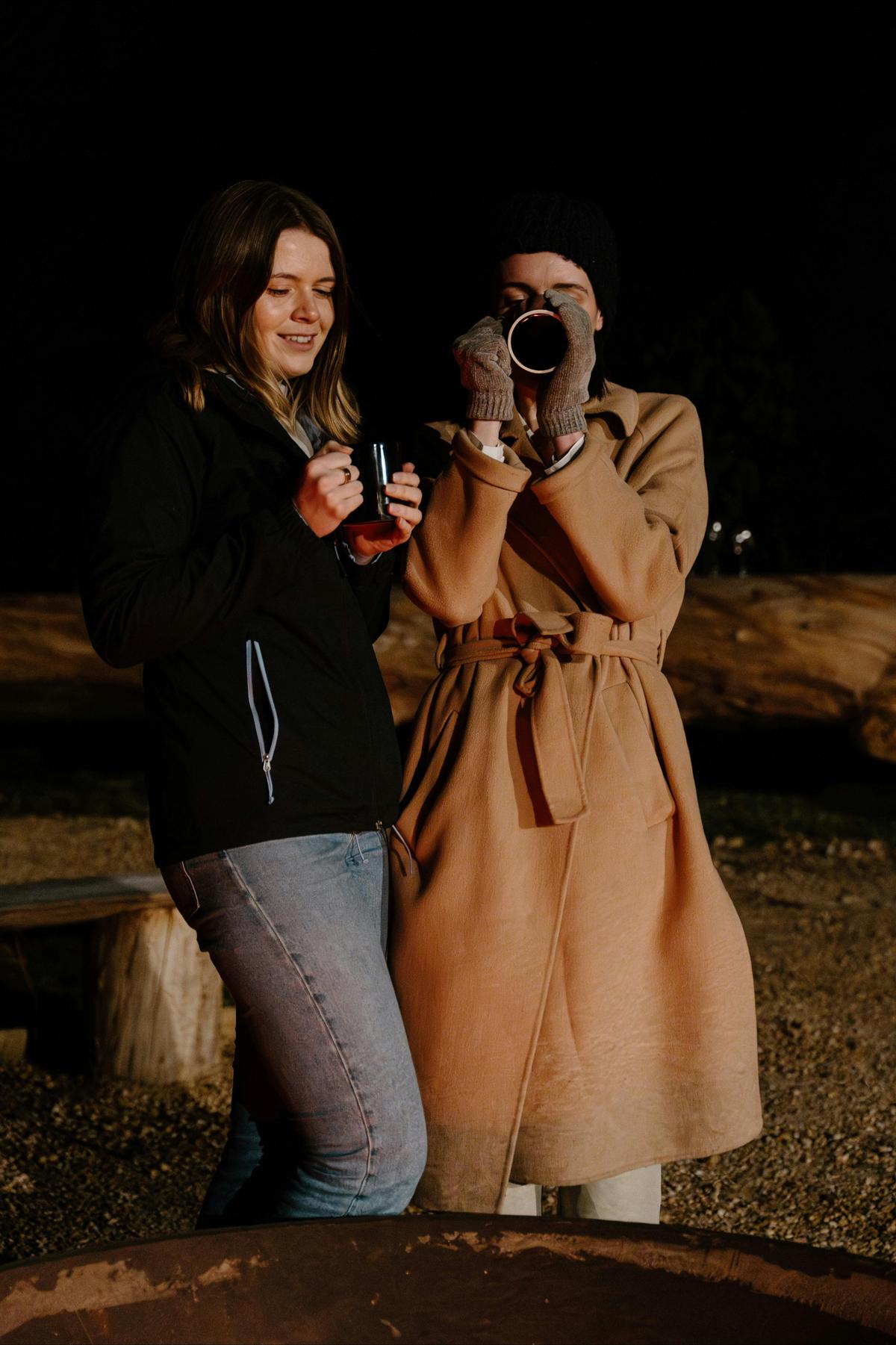Enjoying a hot chocolate around the fire
