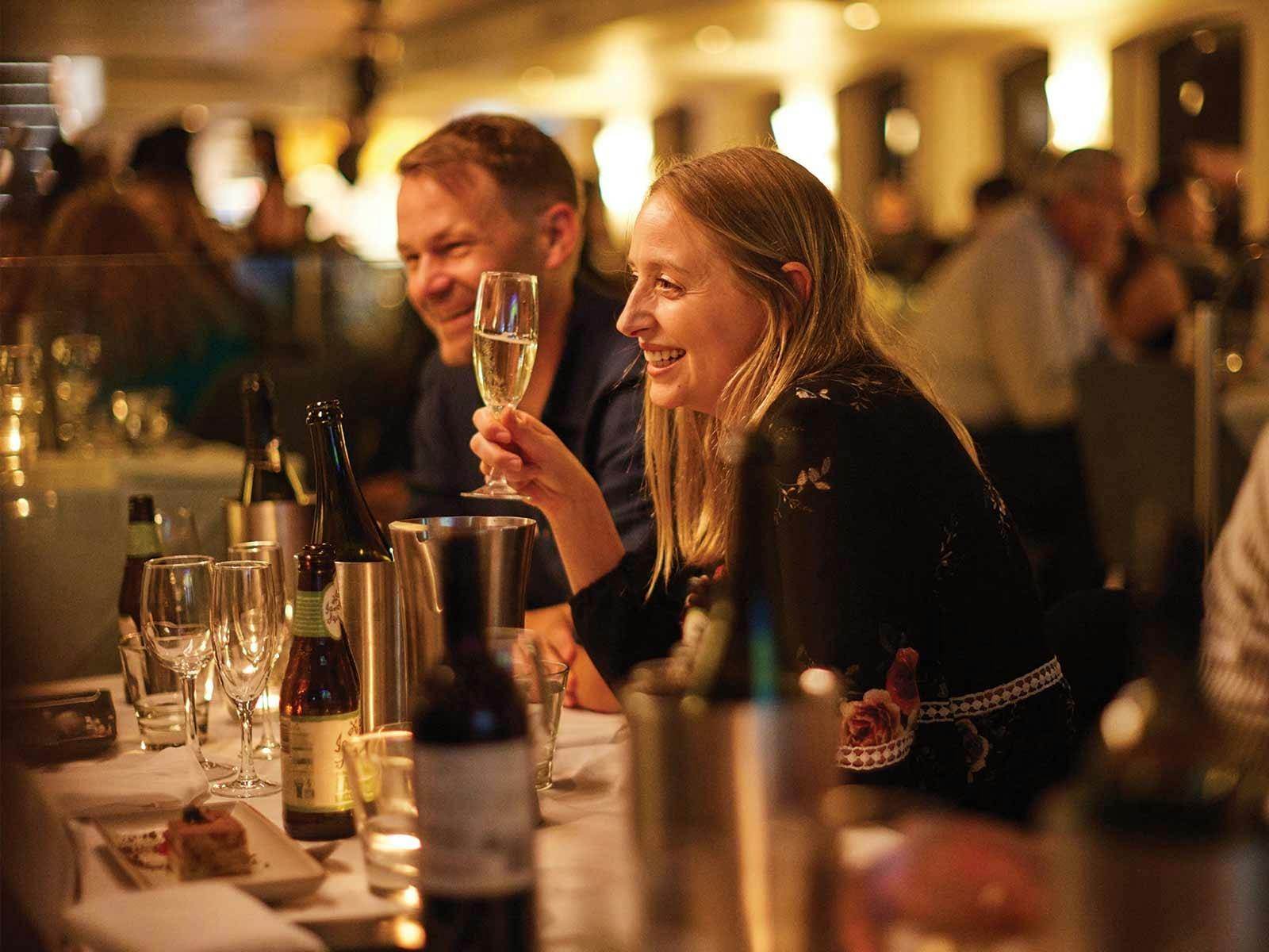 Guests enjoy their drinks aboard the Showboat