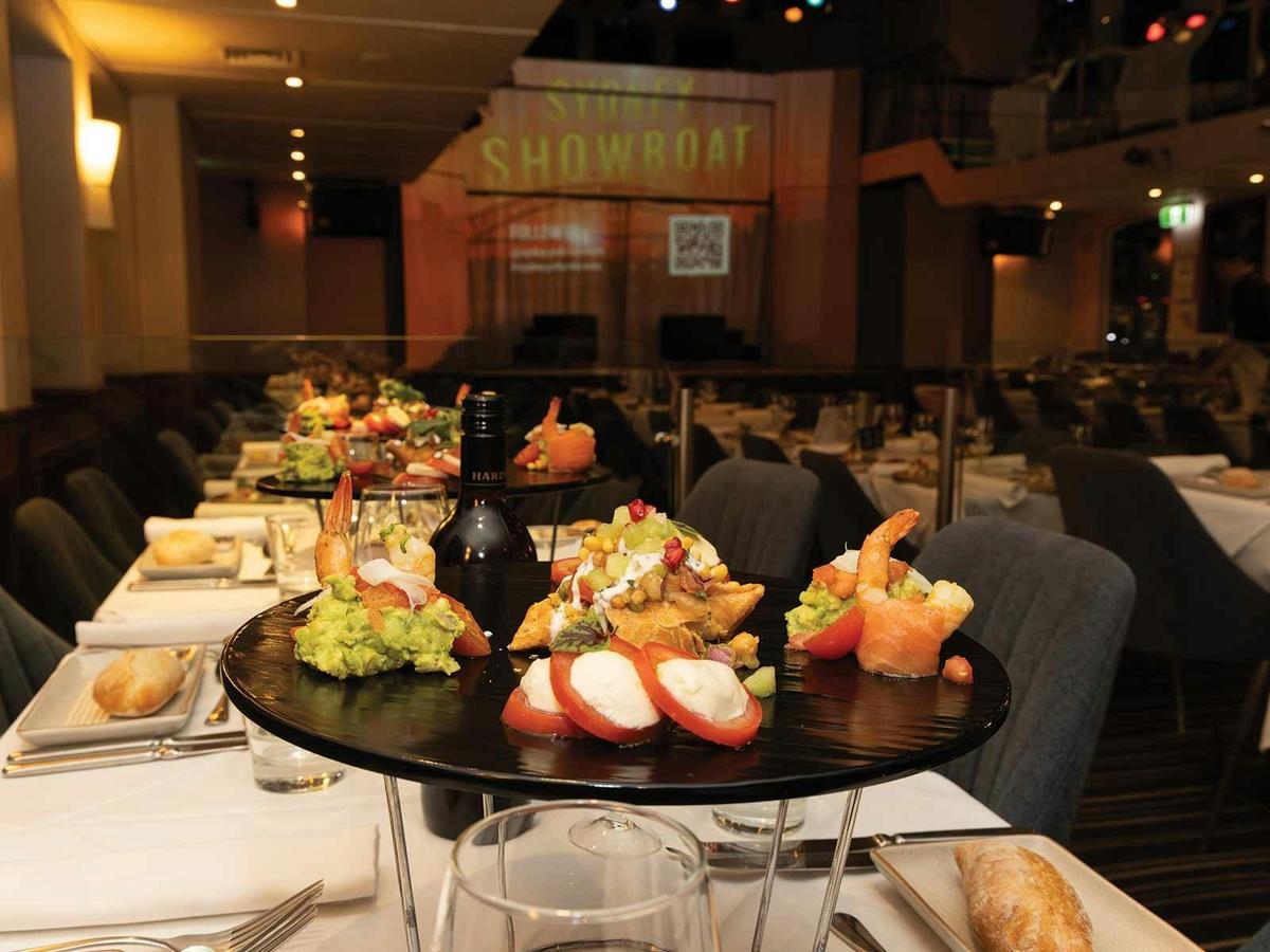 The elegant dining setup on the Showboat dinner cruise