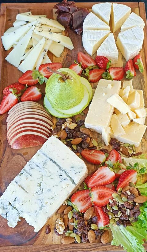 Enjoy a complimentary cheese buffet grazing board on the Tweed River sunset  Cruise