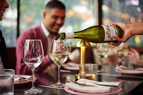 Guests enjoy a glass of wine with each course