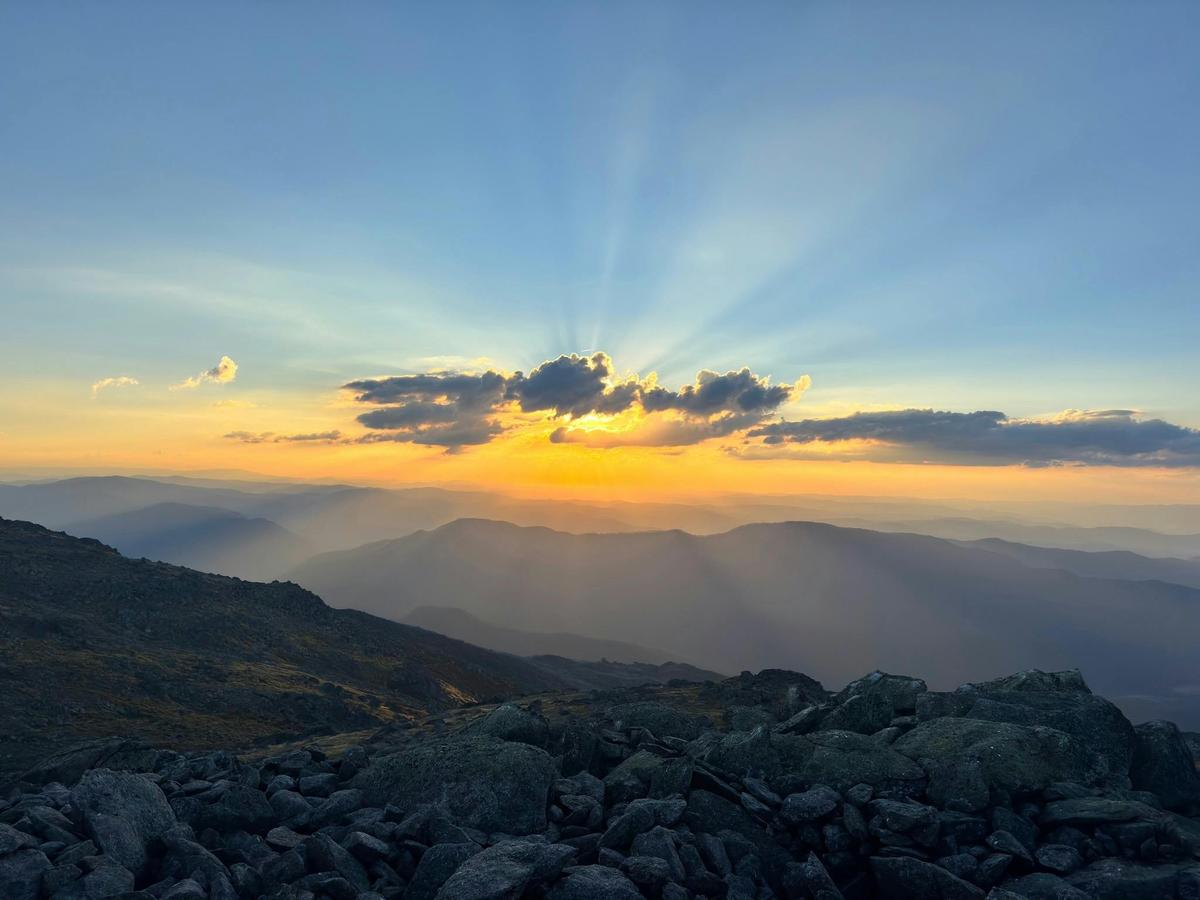 The sun setting over the mountains