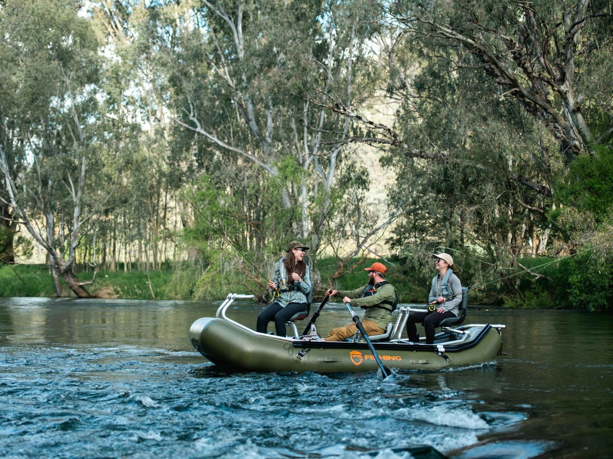Drifting down the Tumut River fly fishing for trout.