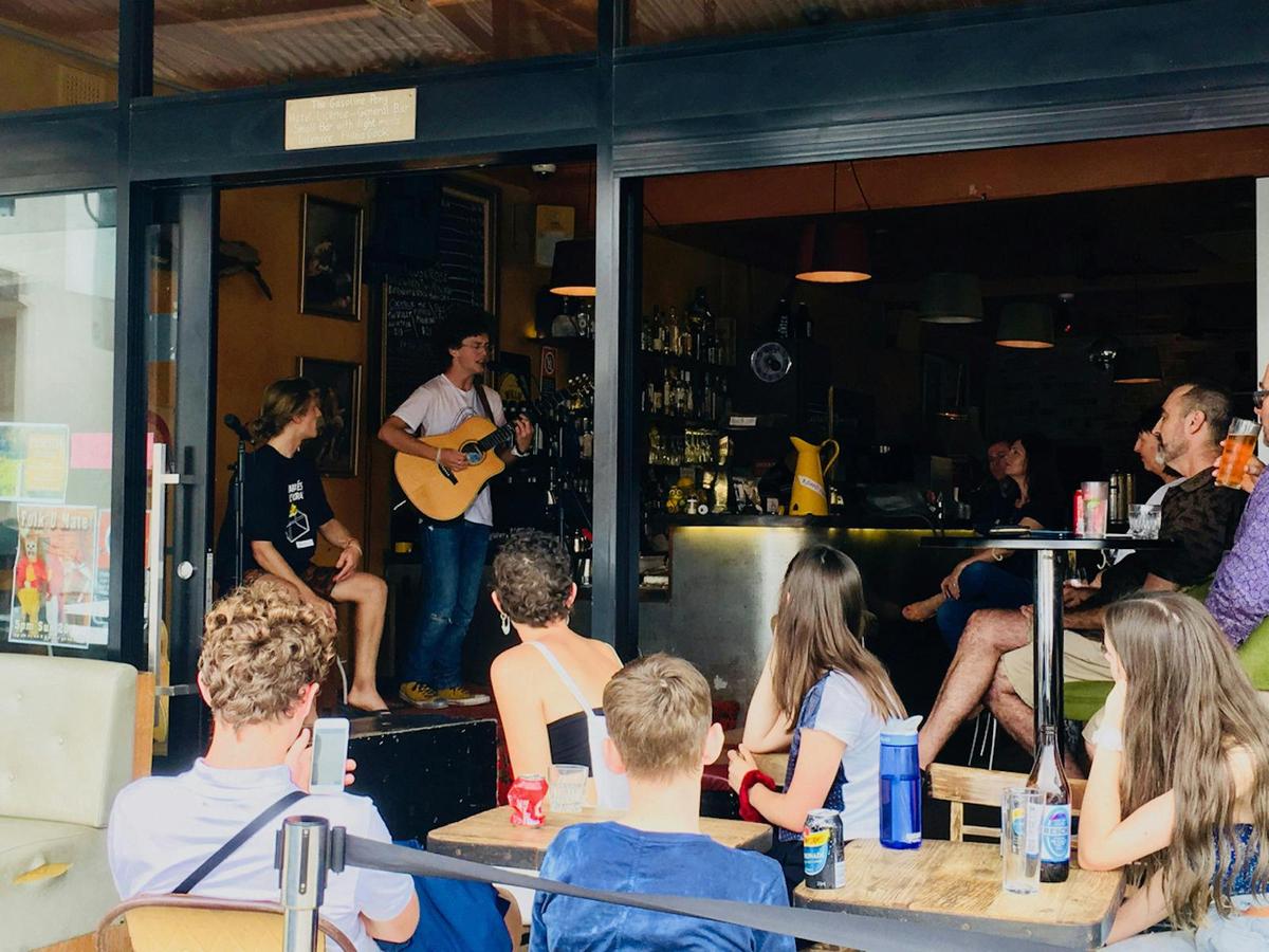 Sights of Marrickville: people watching a band perform at the Gaspo