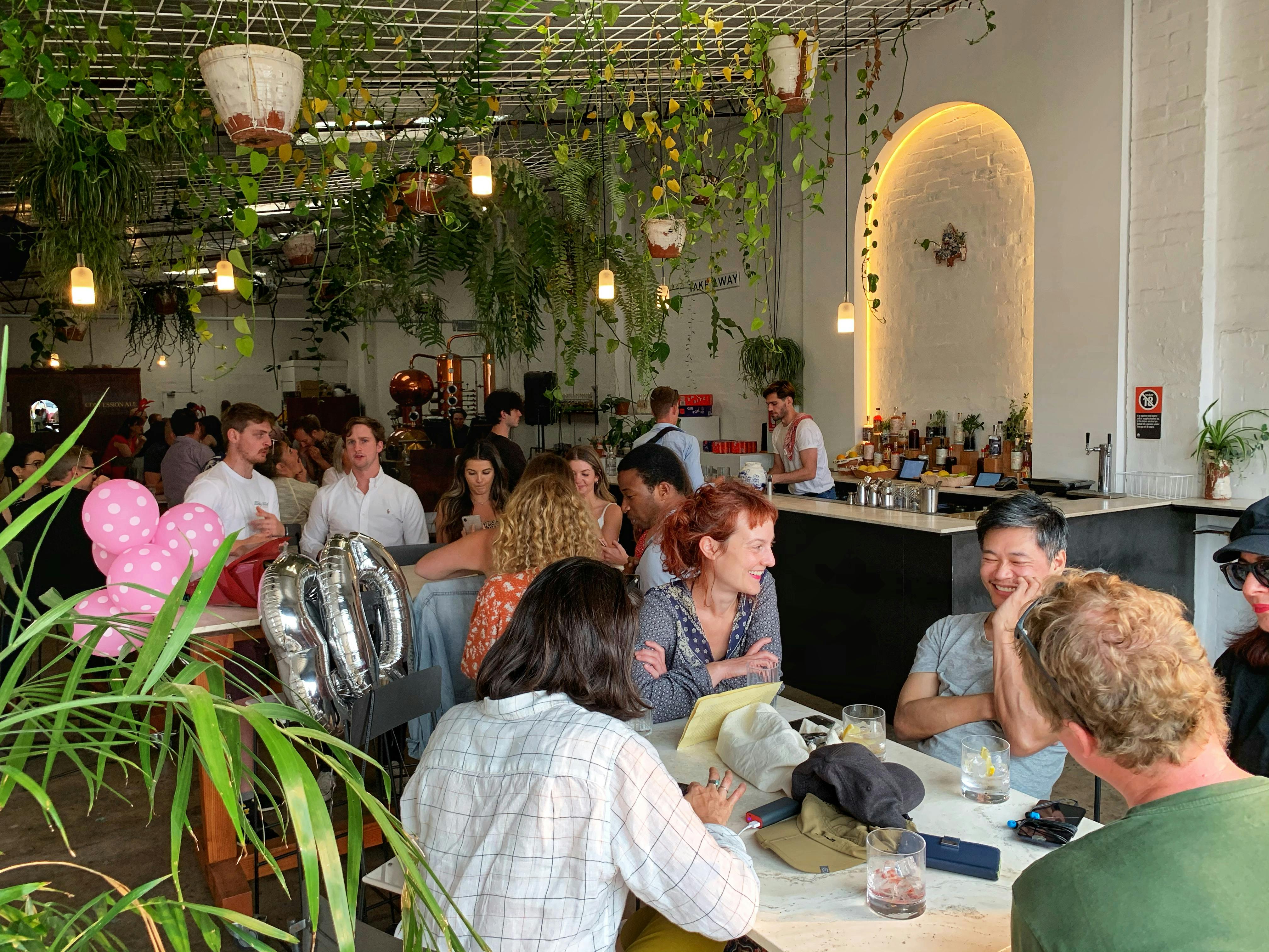 Enjoying a drink at the Gin Distillery