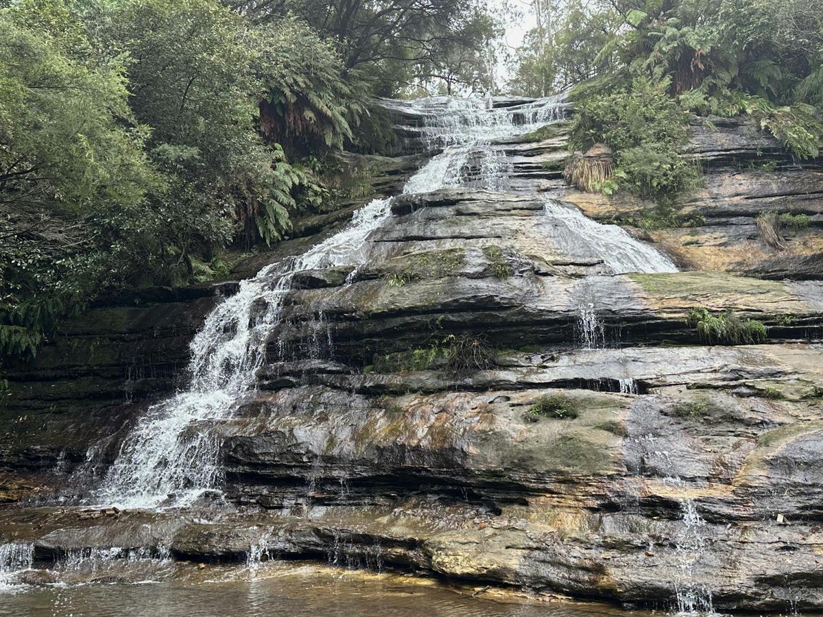 Walk on the stepping stones at the bottom of the amazing Katoomba Cascade Falls