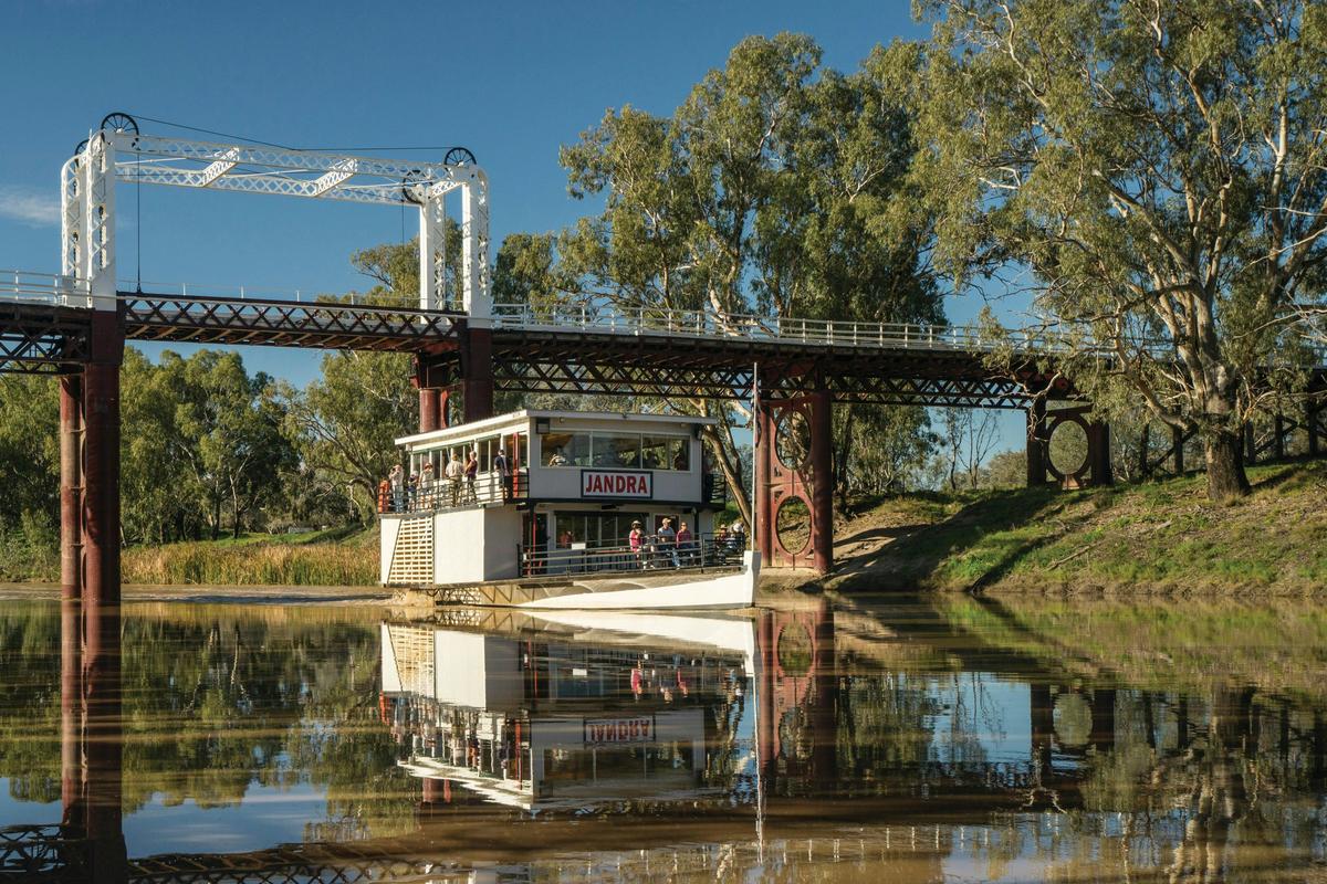The Paddle Vessel (PV) Jandra cruising down the Darling River in Bourke