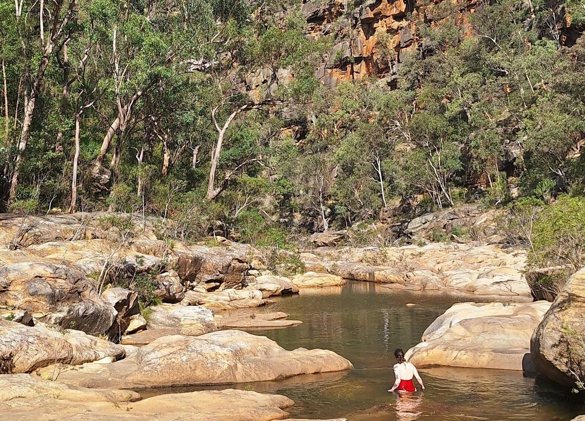 Take a dip among the soaring sandstone cliffs and pristine bushland