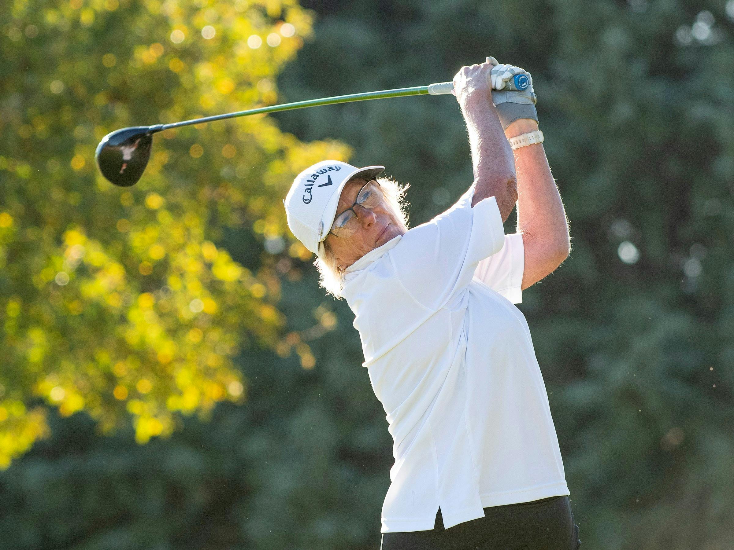 A lady playing golf at Coolamatong