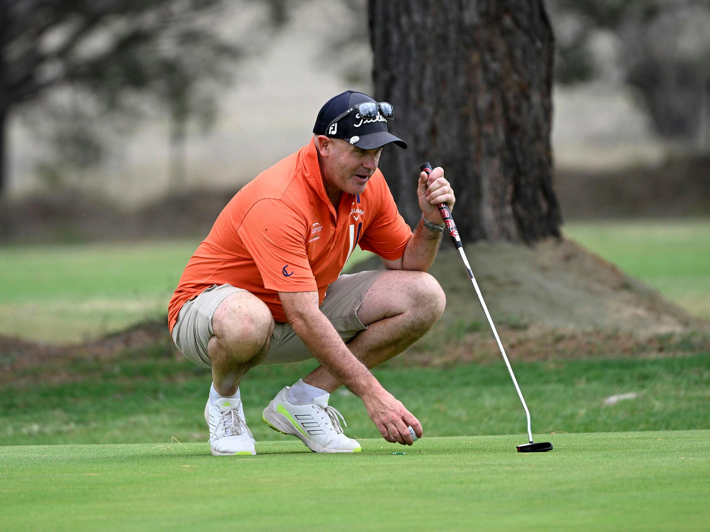 A player lines up a putt on the 16th hole at Coolamatong.