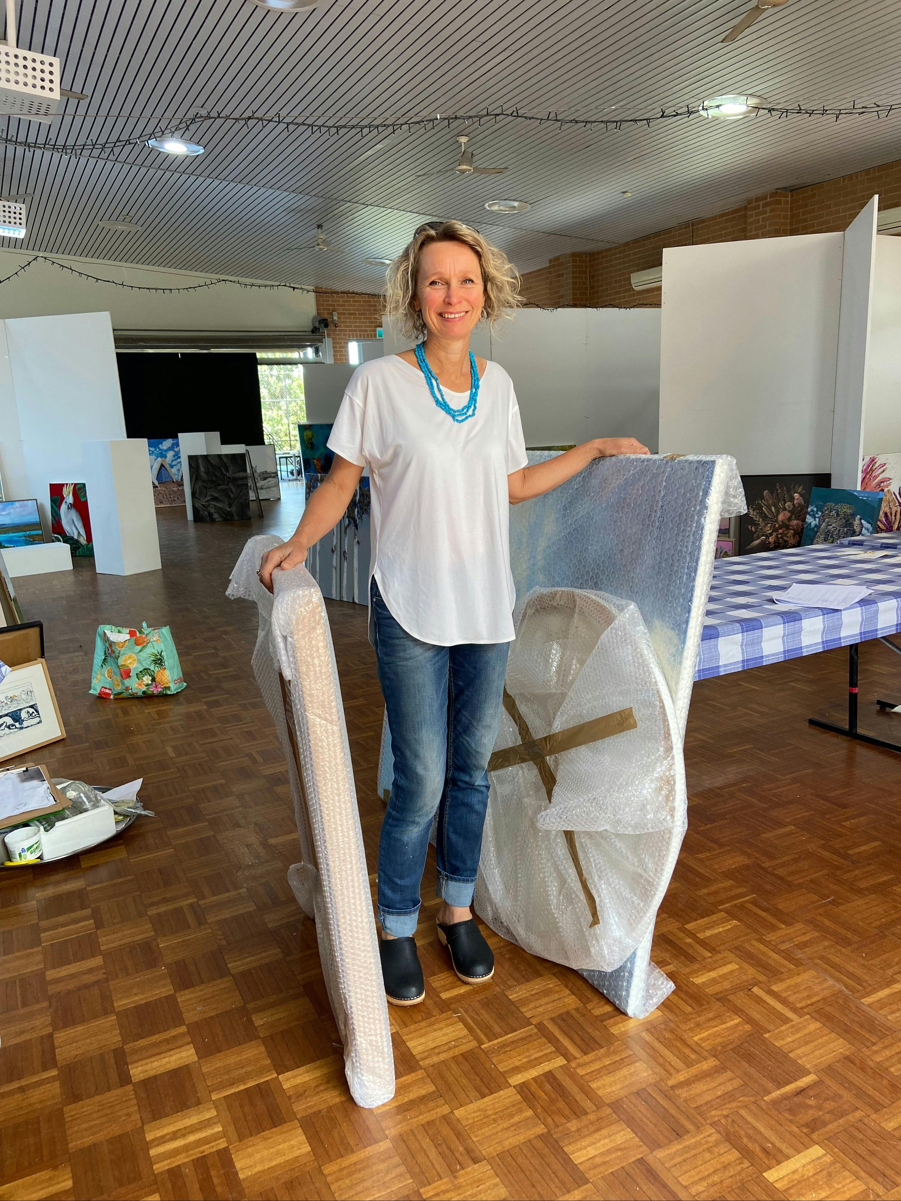Artist, Corinne Loxton in her studio
